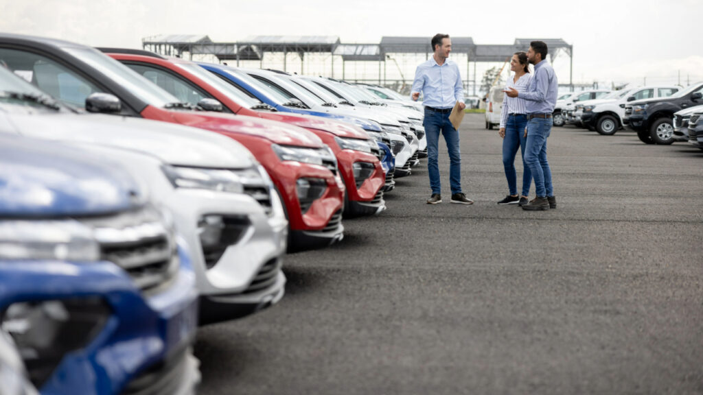 Car salesman dealership istock