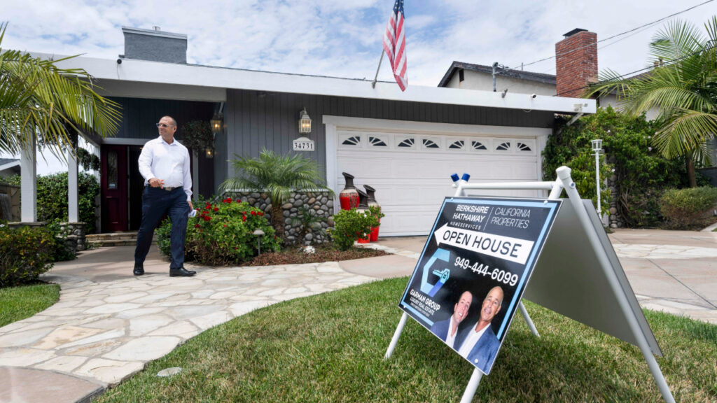 Home for sale person walking getty