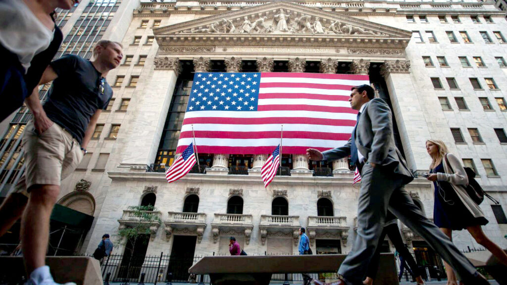 Wall street american flag people getty